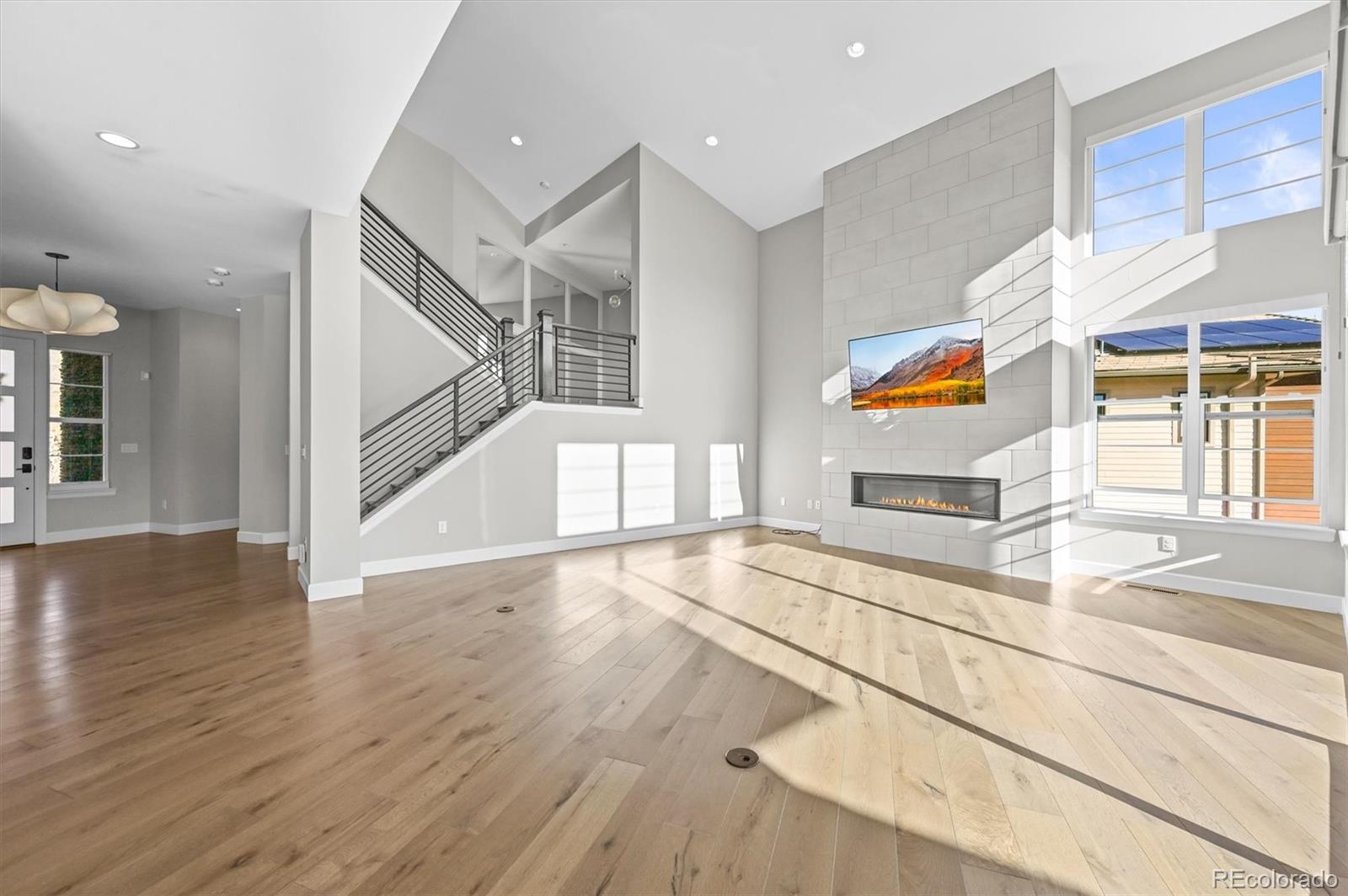 10814 Bluffside Drive Lone Tree, CO 80124 - Photo 12 of 50 a view of an entryway with wooden floor