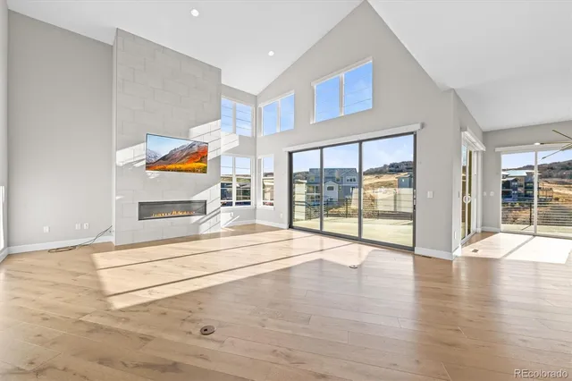 a view of an entryway with wooden floor