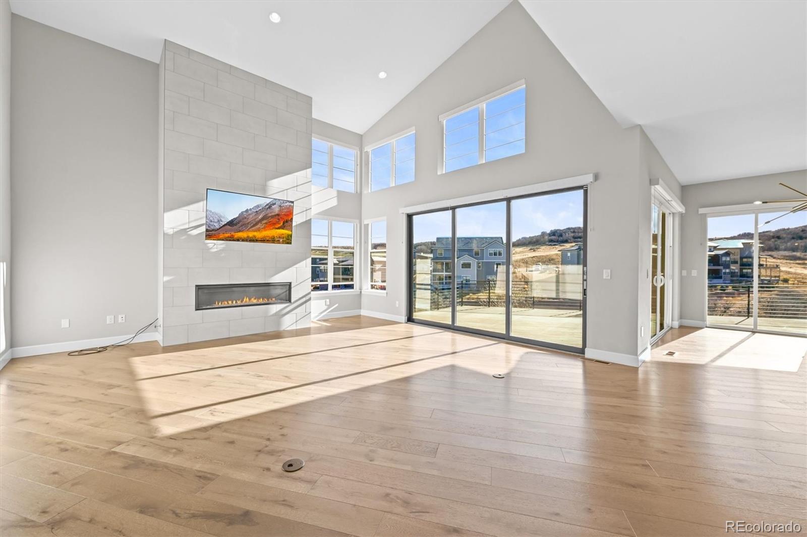 10814 Bluffside Drive Lone Tree, CO 80124 - Photo 2 of 50 a view of an entryway with wooden floor