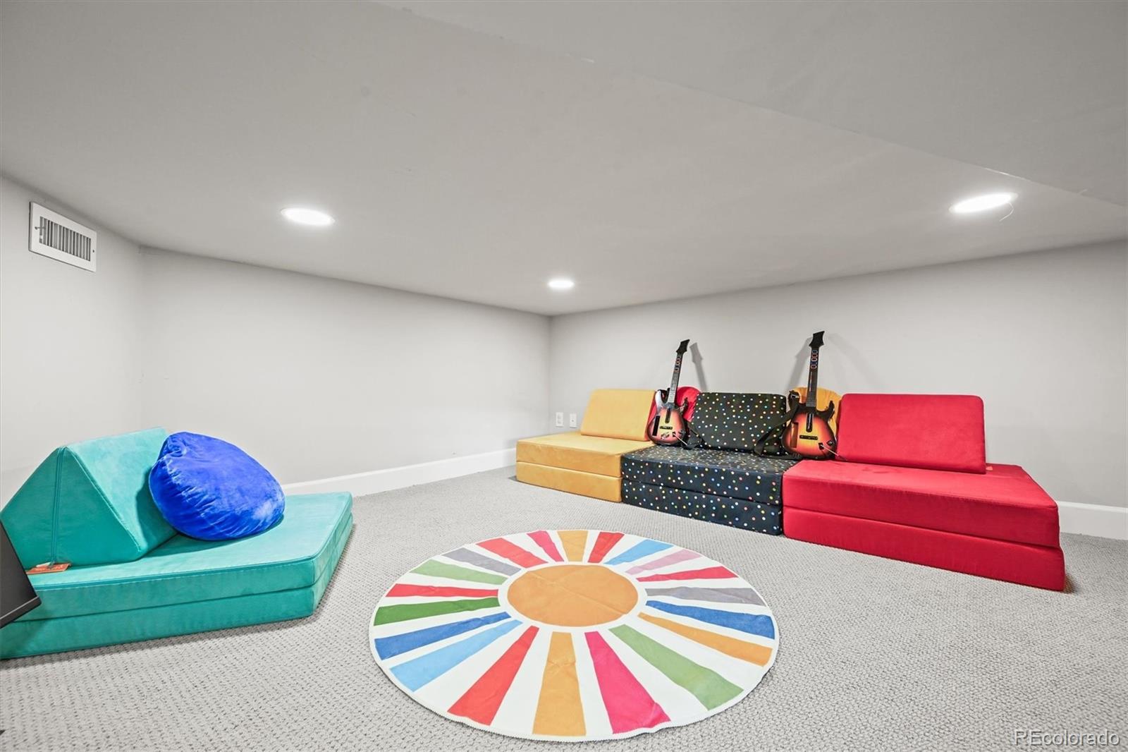 10814 Bluffside Drive Lone Tree, CO 80124 - Photo 29 of 50 a living room with furniture and kitchen view
