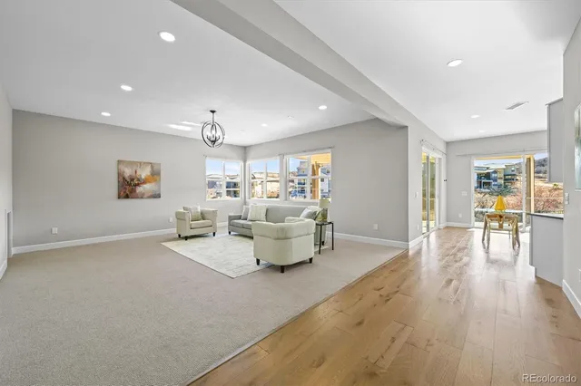a living room with furniture and a table