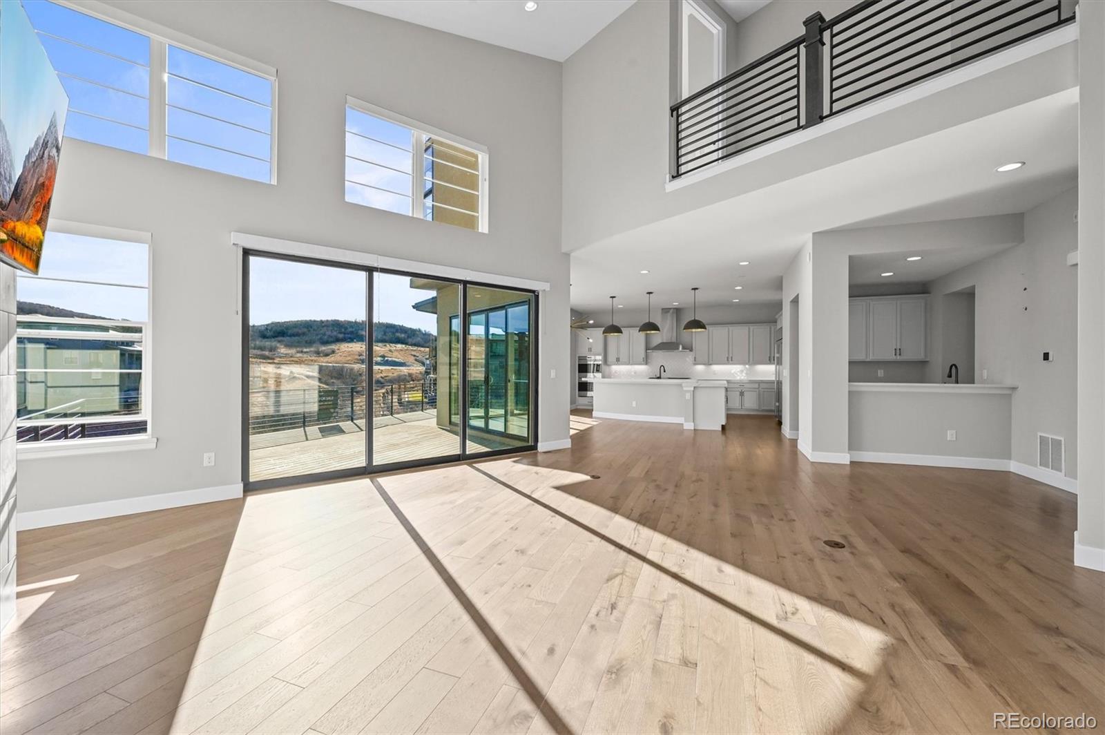 10814 Bluffside Drive Lone Tree, CO 80124 - Photo 3 of 50 a large white building with glass windows