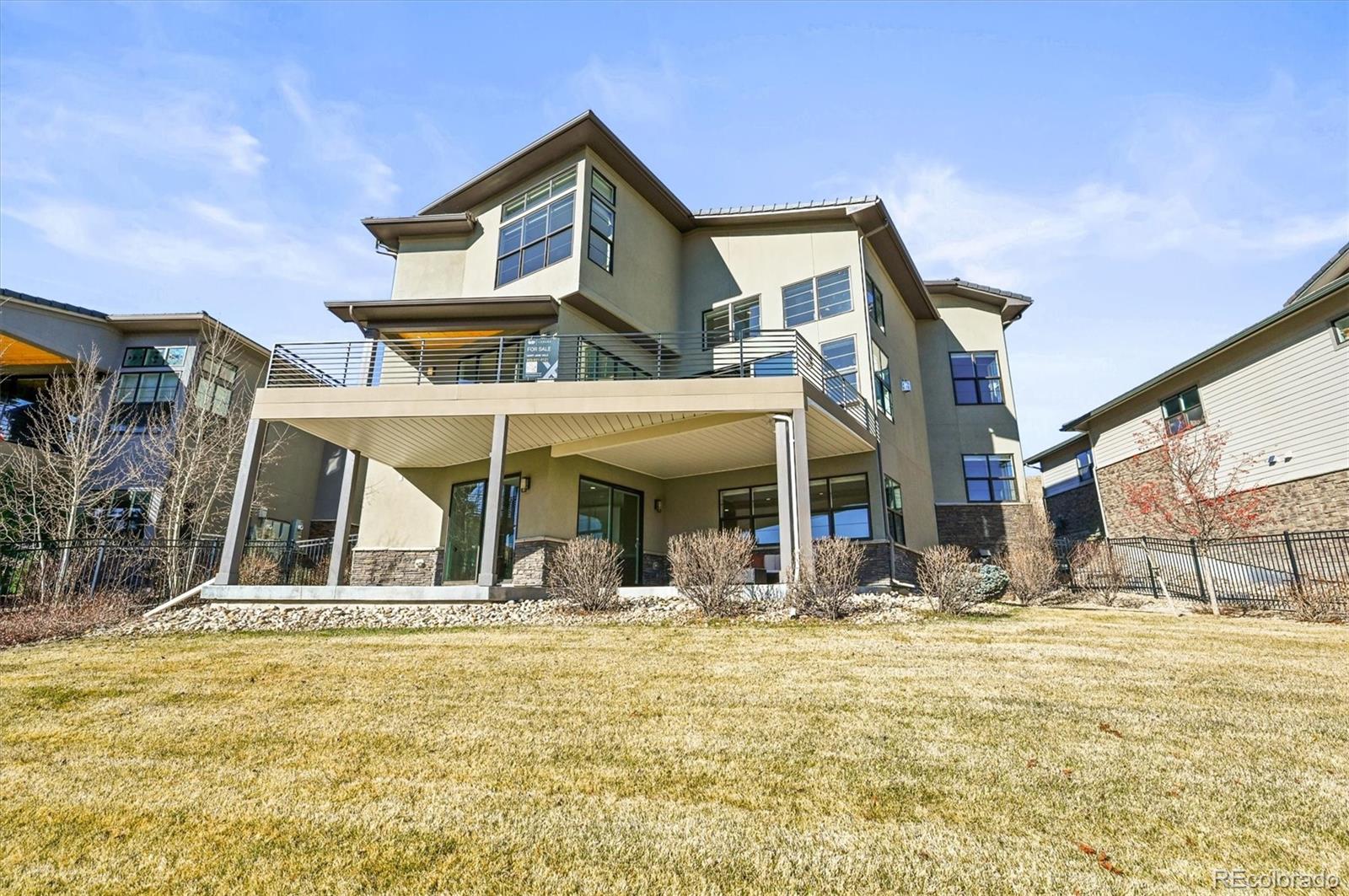 10814 Bluffside Drive Lone Tree, CO 80124 - Photo 40 of 50 a view of a house with snow on the wall