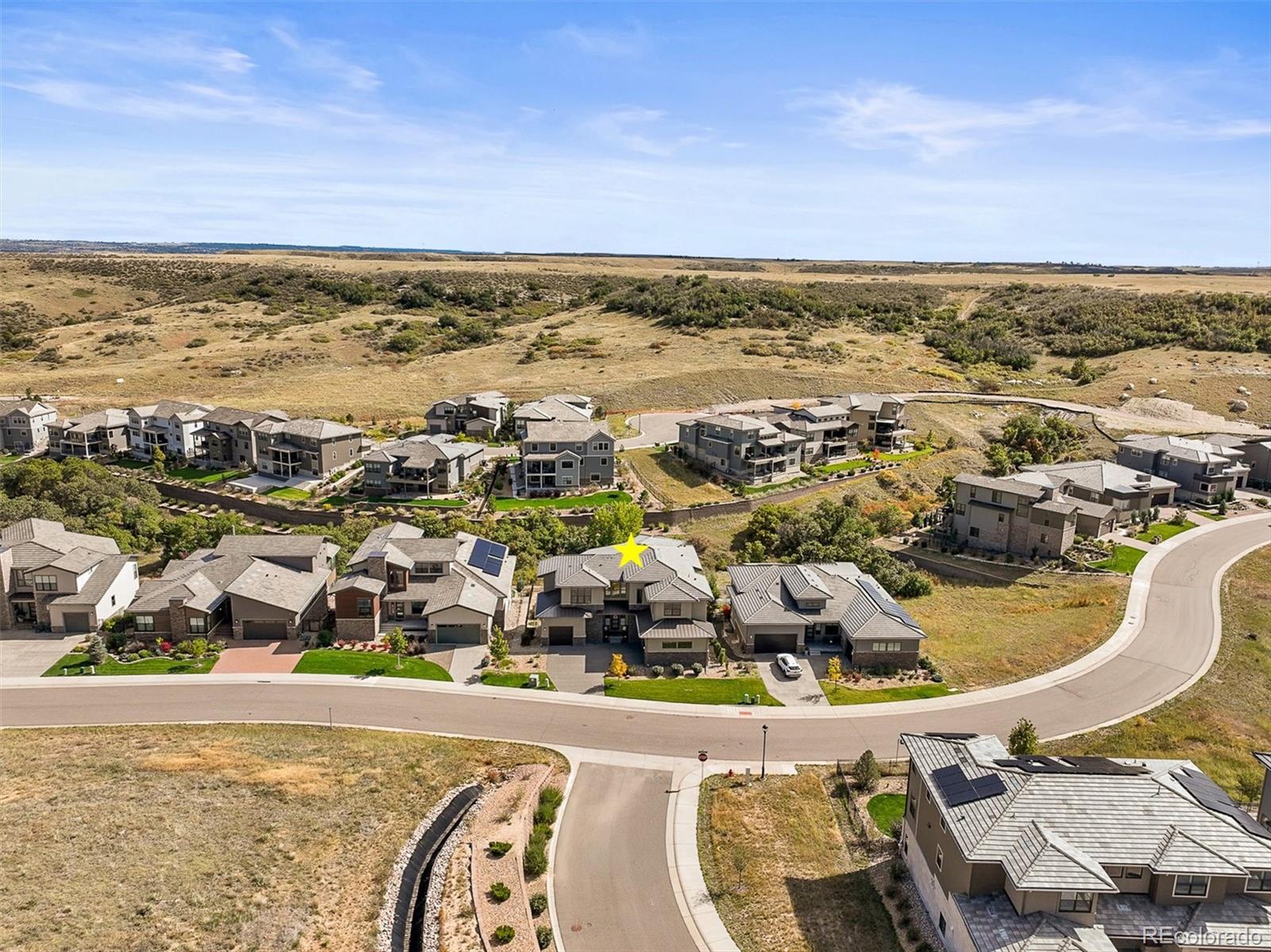 10814 Bluffside Drive Lone Tree, CO 80124 - Photo 41 of 50 an aerial view of residential building and ocean