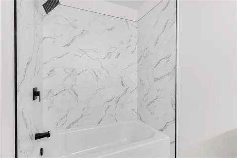 a bathroom with a bathtub