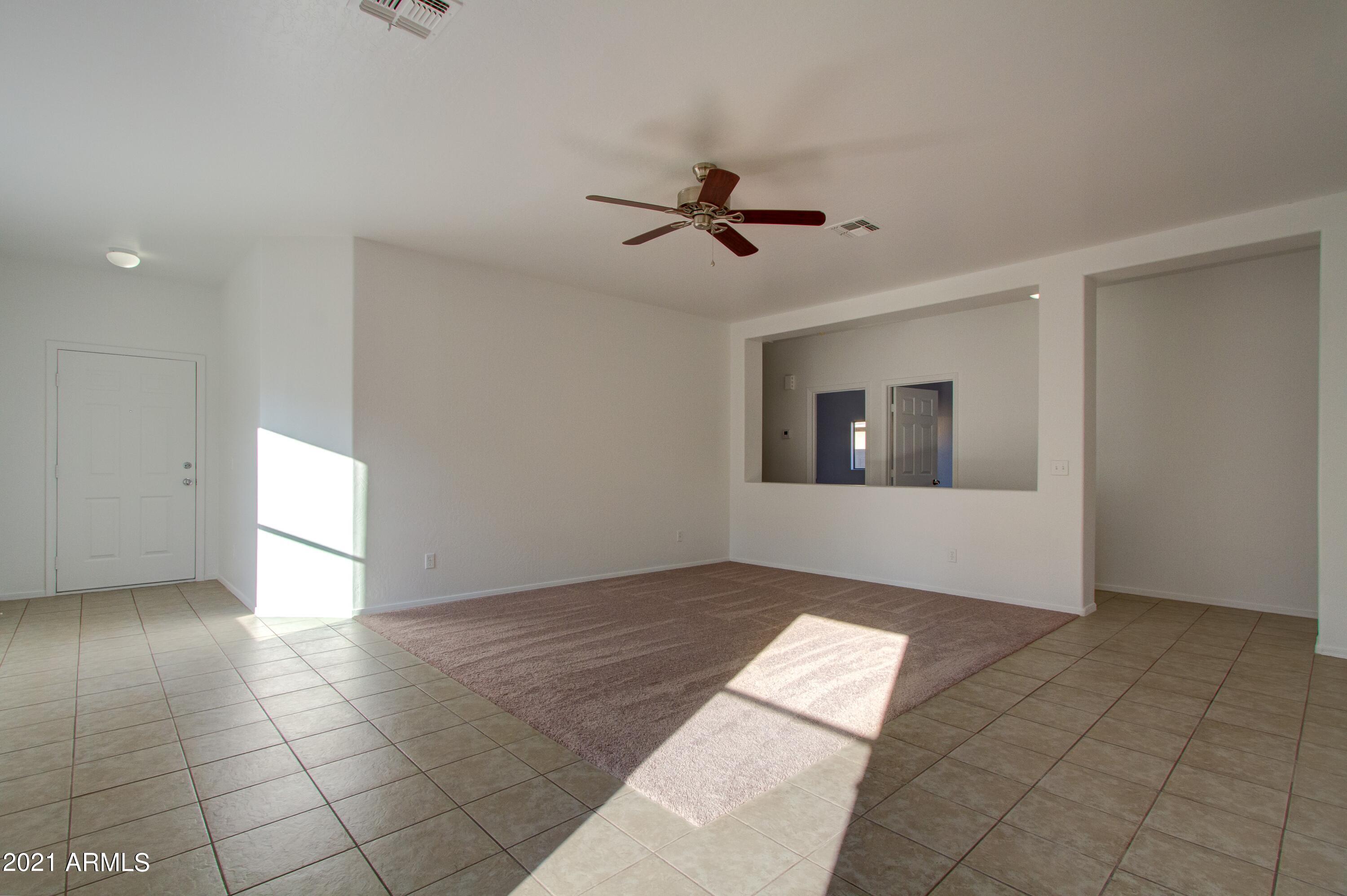 913 East Pedro Road Phoenix, AZ 85042 - Photo 7 of 15 007_Living Room To Hallway