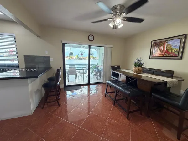 a bedroom with a bed and flat screen tv