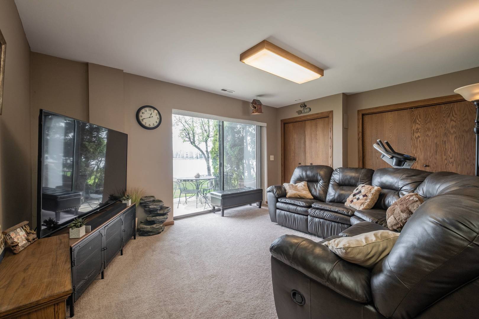 759 North Old Rand Road Lake Zurich, IL 60047 - Photo 13 of 34 a living room with furniture and a flat screen tv