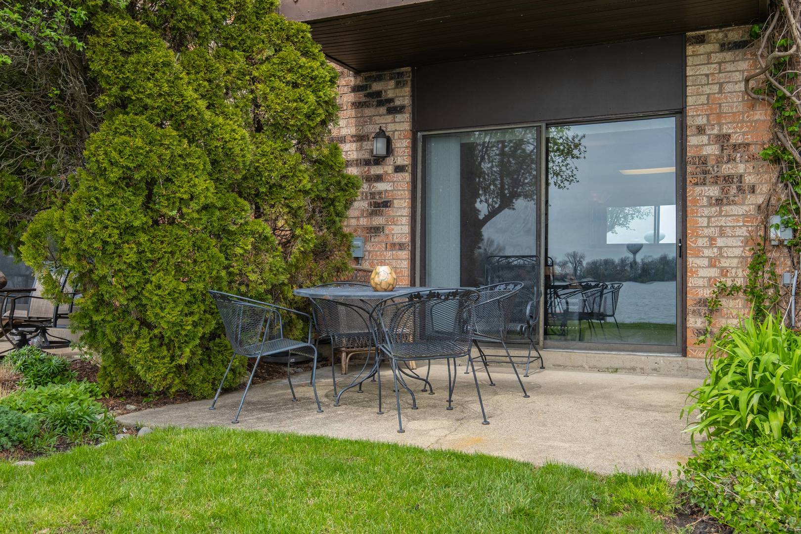 759 North Old Rand Road Lake Zurich, IL 60047 - Photo 15 of 34 a view of outdoor dining space with a garden and patio