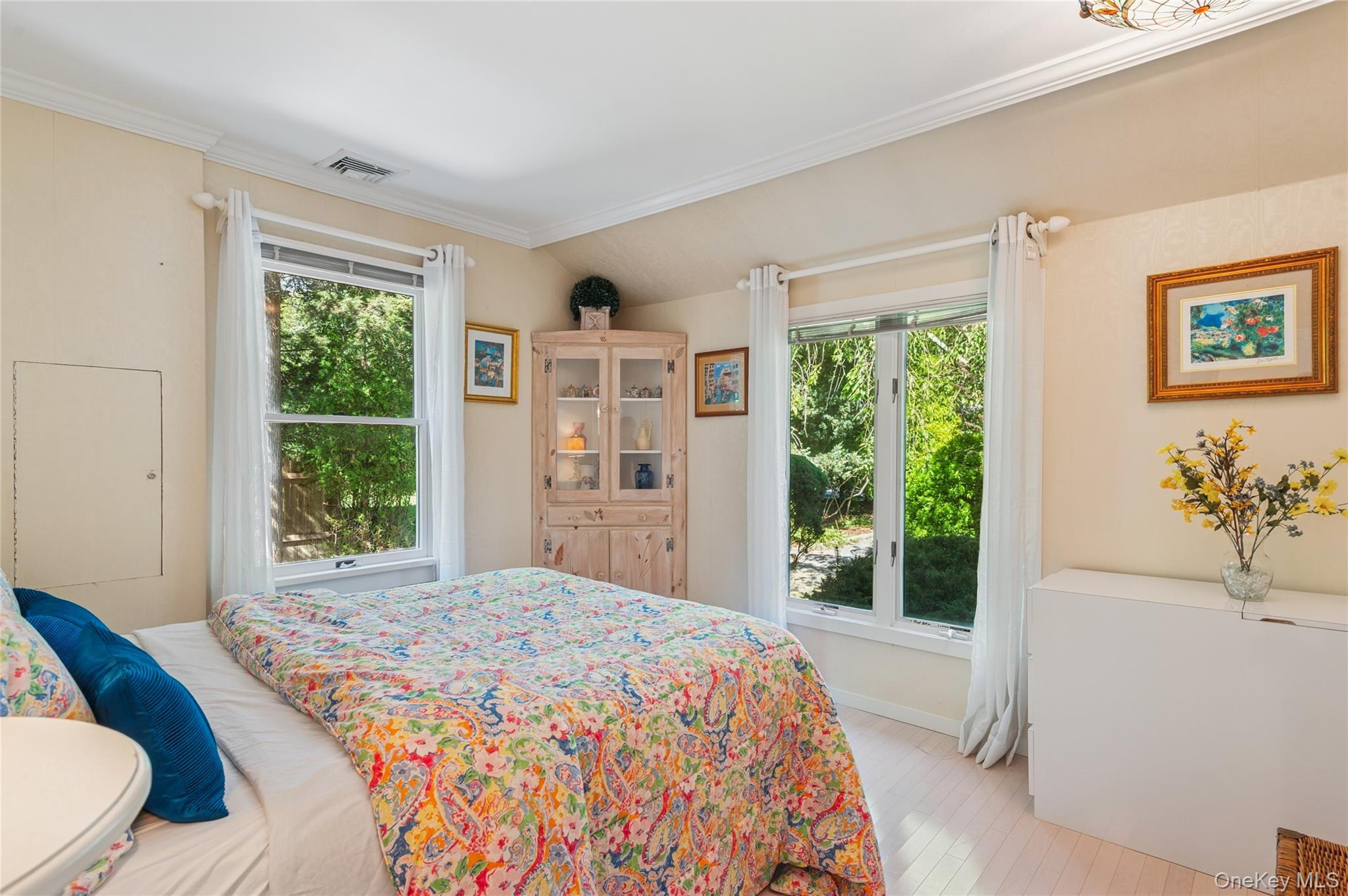 35 Halsey Road Remsenburg, NY 11960 - Photo 12 of 17 a bedroom with a bed and a window