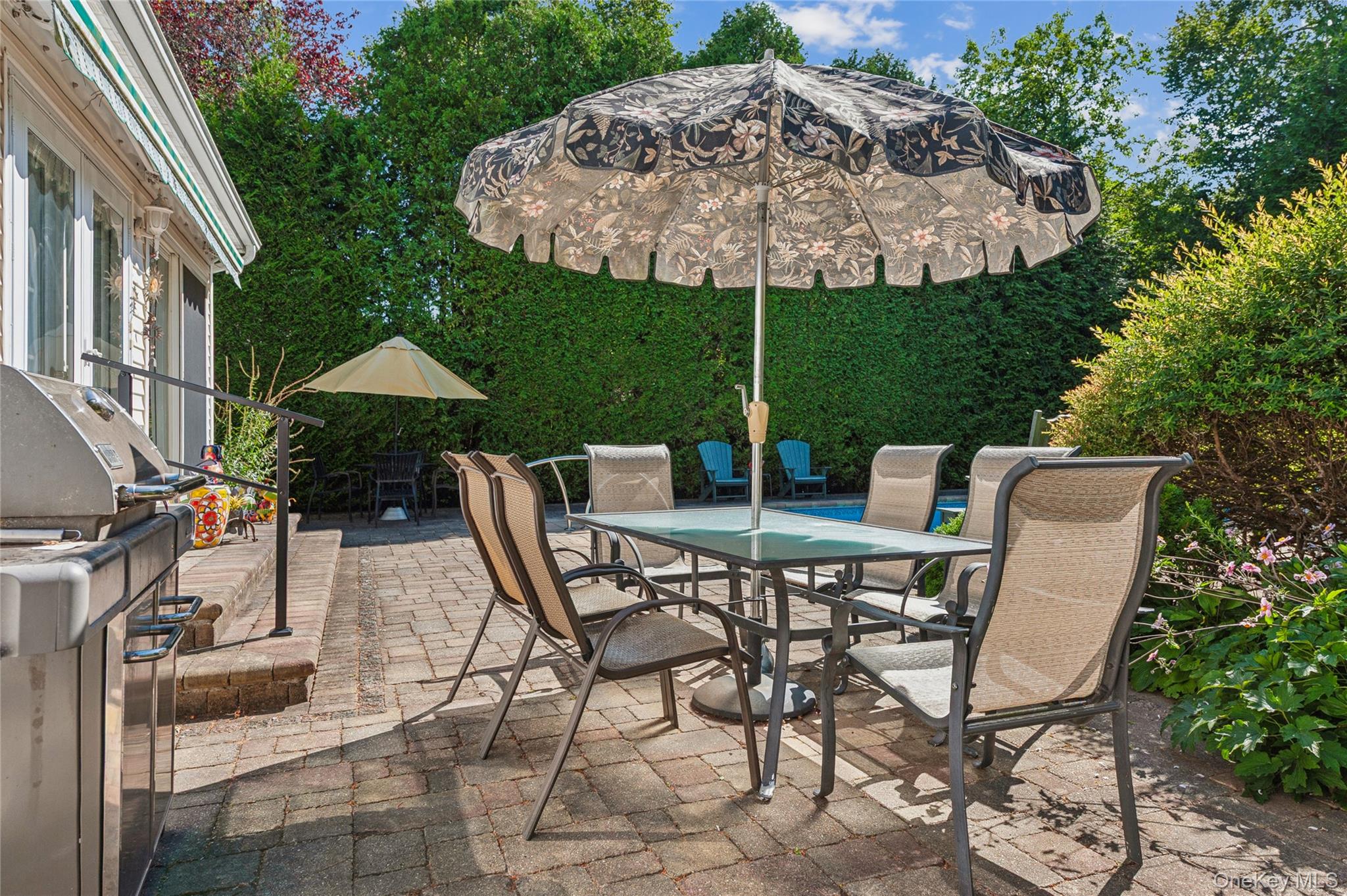 35 Halsey Road Remsenburg, NY 11960 - Photo 16 of 17 a view of an outdoor sitting area with furniture