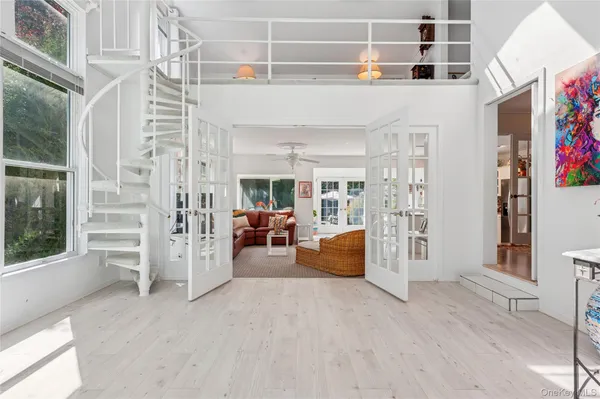 a view of livingroom with furniture and windows
