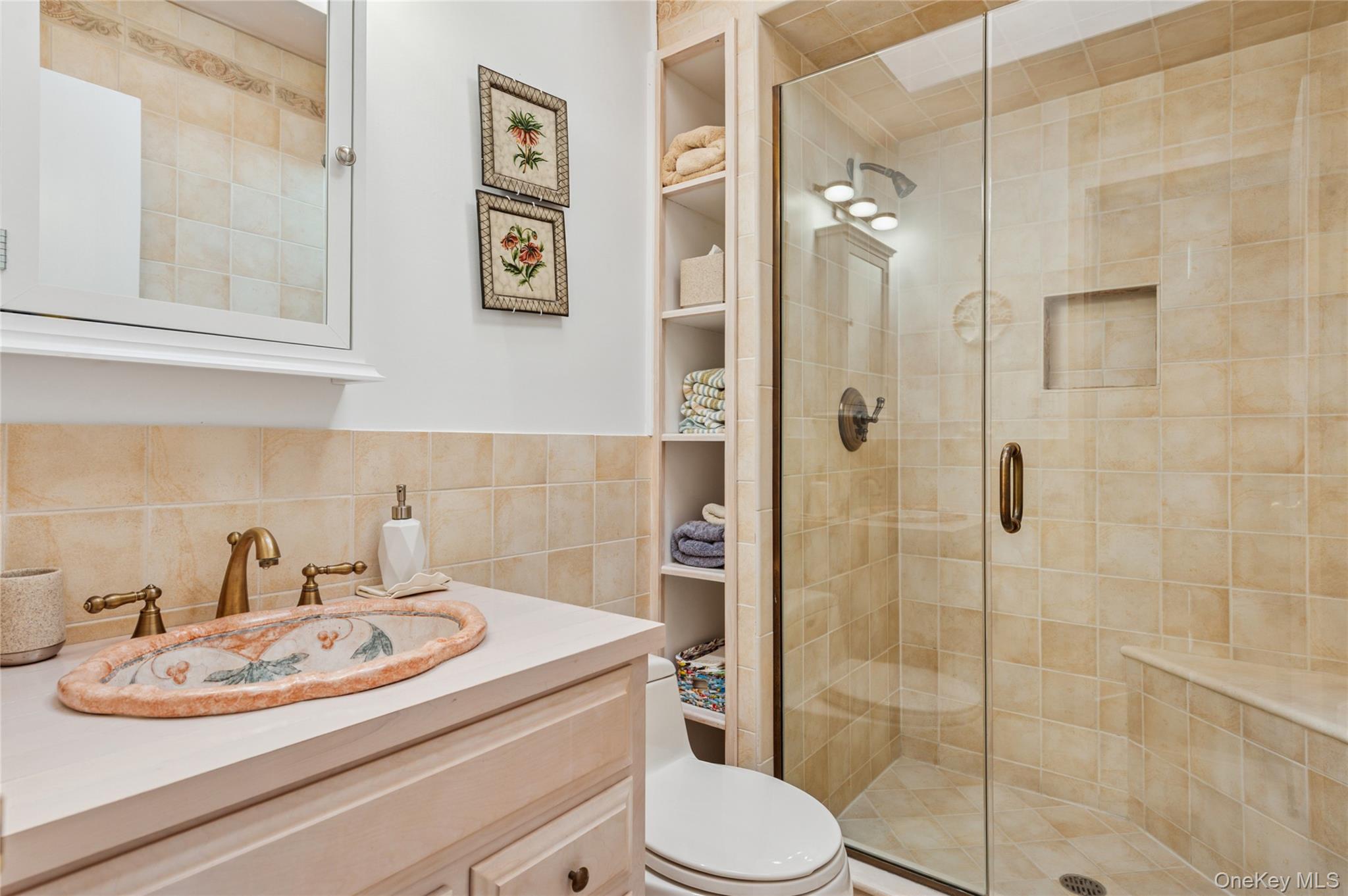 35 Halsey Road Remsenburg, NY 11960 - Photo 8 of 17 a bathroom with a sink toilet and shower