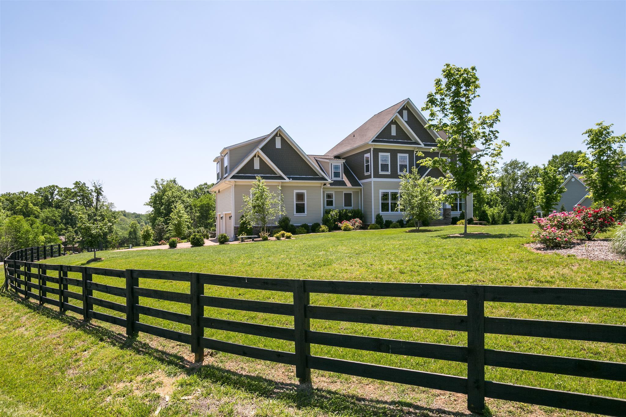 2533 Belle Brook Drive Franklin, TN 37067 - Photo 1 of 30 a front view of a house with a yard