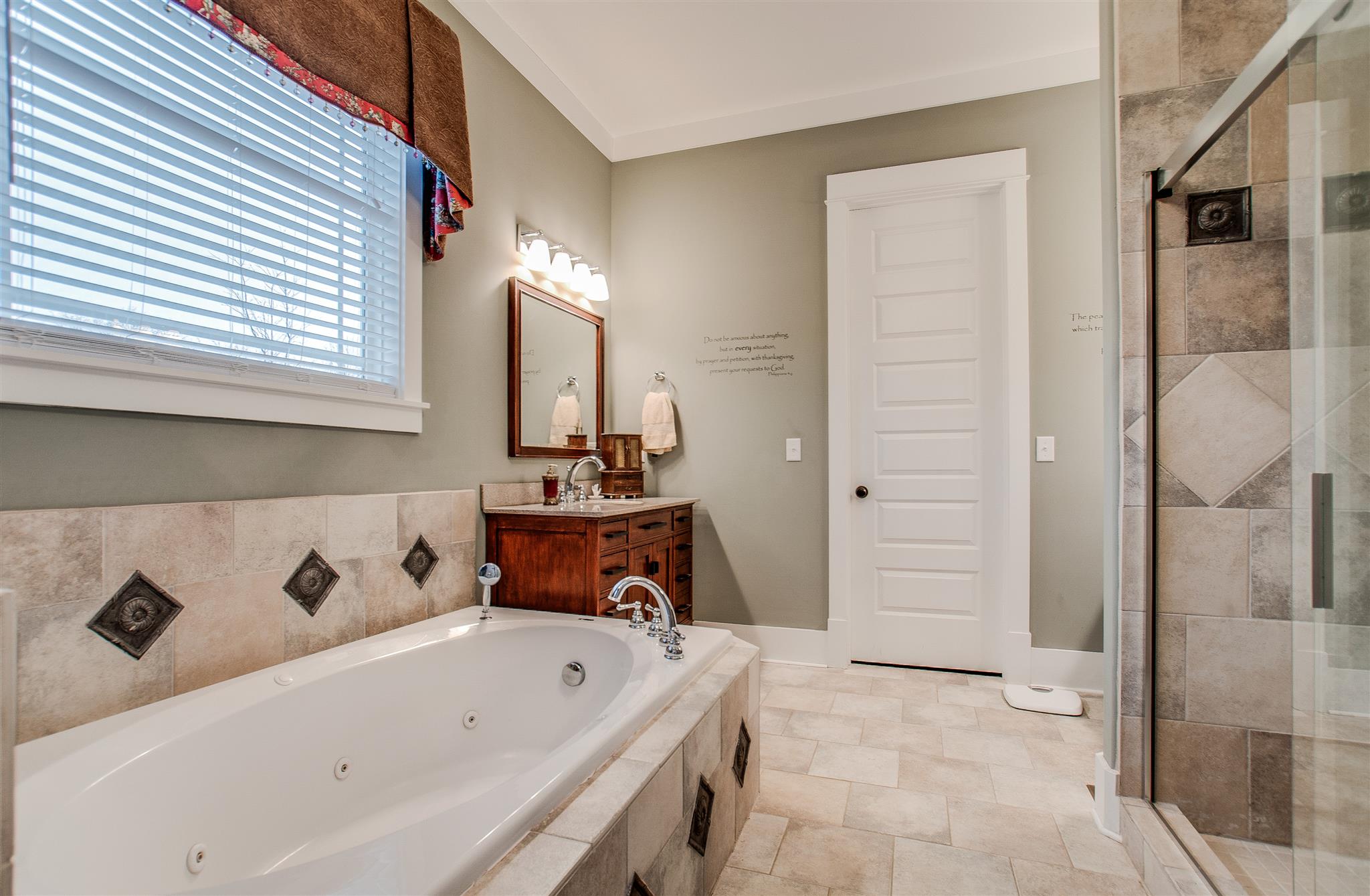 2533 Belle Brook Drive Franklin, TN 37067 - Photo 20 of 30 a bathroom with a tub sink and mirror