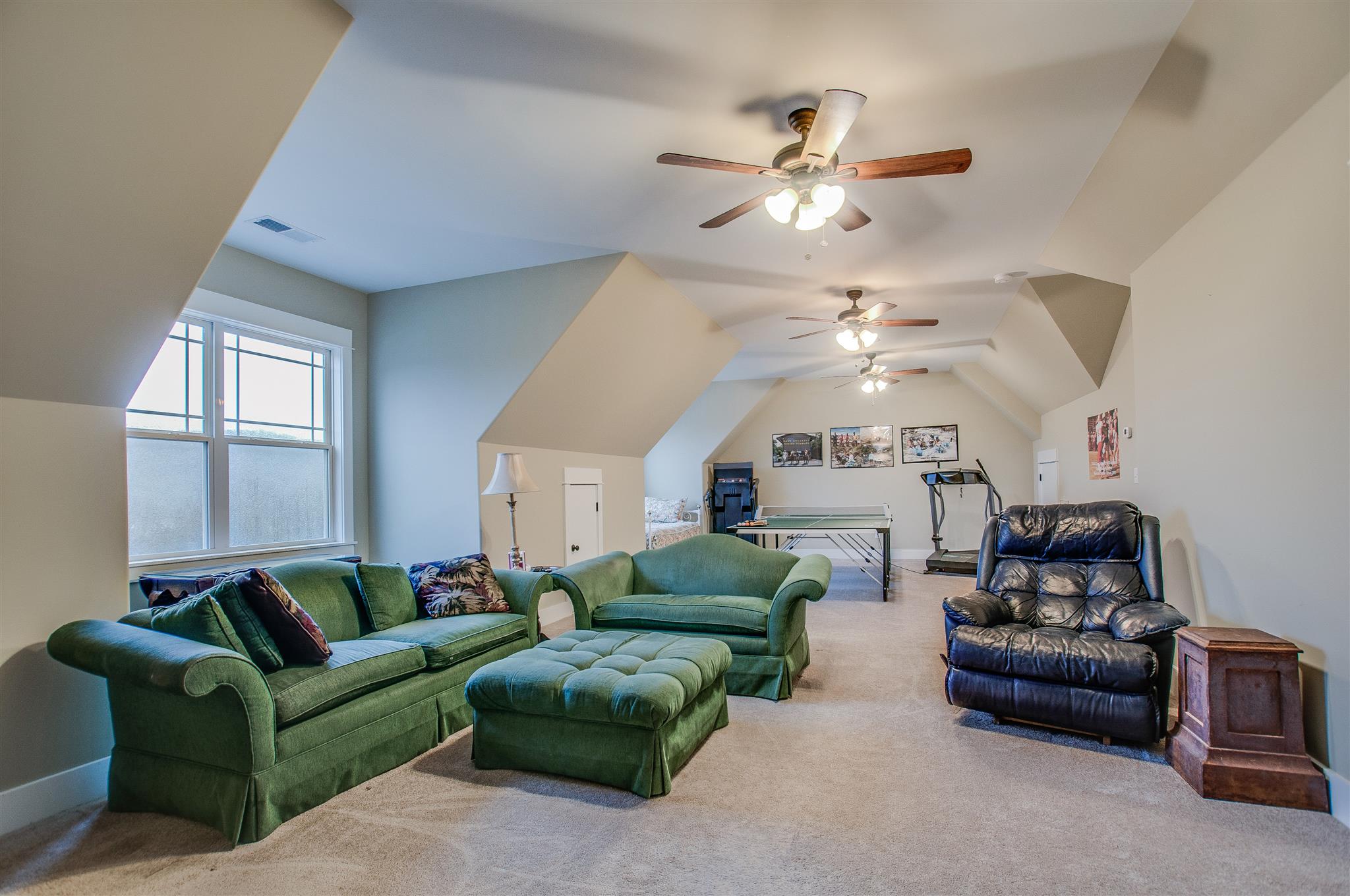 2533 Belle Brook Drive Franklin, TN 37067 - Photo 27 of 30 a living room with furniture and a chandelier
