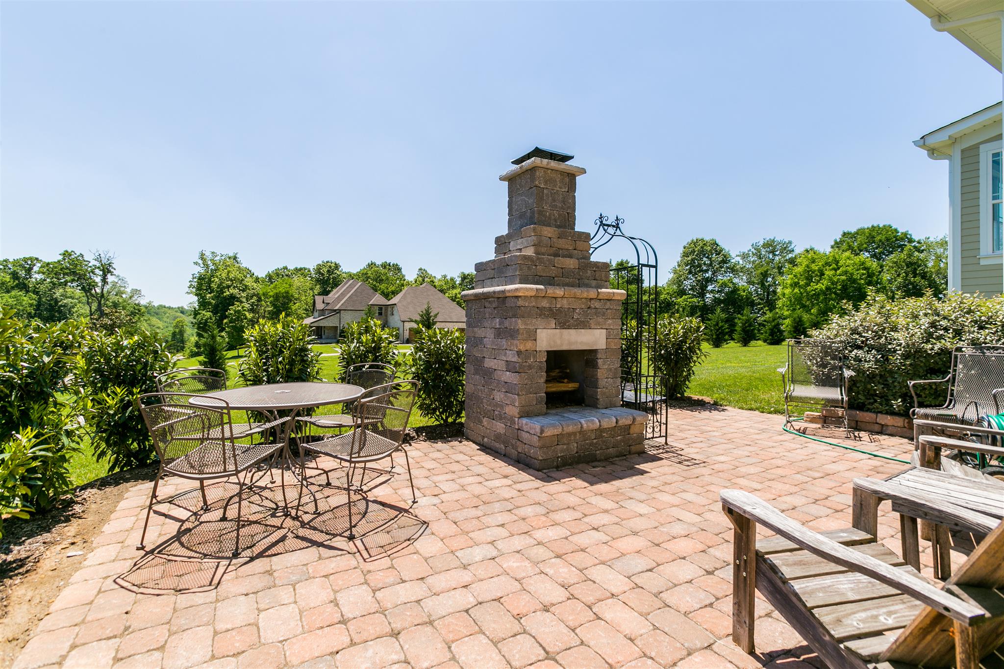 2533 Belle Brook Drive Franklin, TN 37067 - Photo 28 of 30 a view of a terrace with furniture and a garden