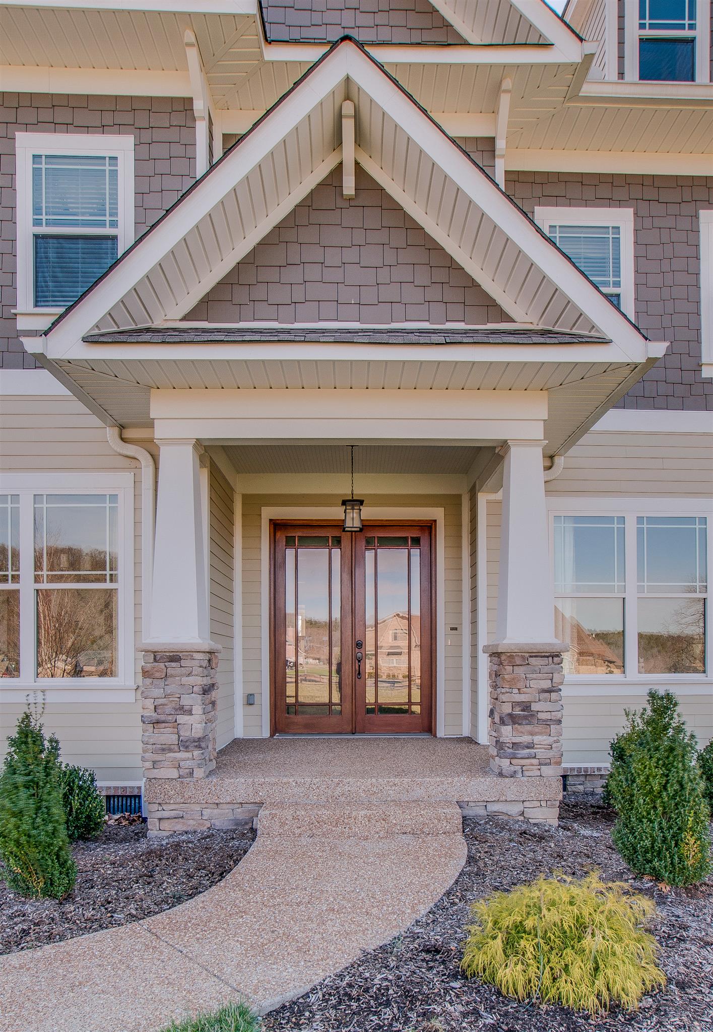 2533 Belle Brook Drive Franklin, TN 37067 - Photo 3 of 30 a front view of a house with a yard