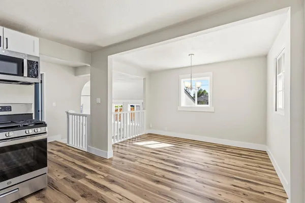 a view of room with a window and ceiling fan