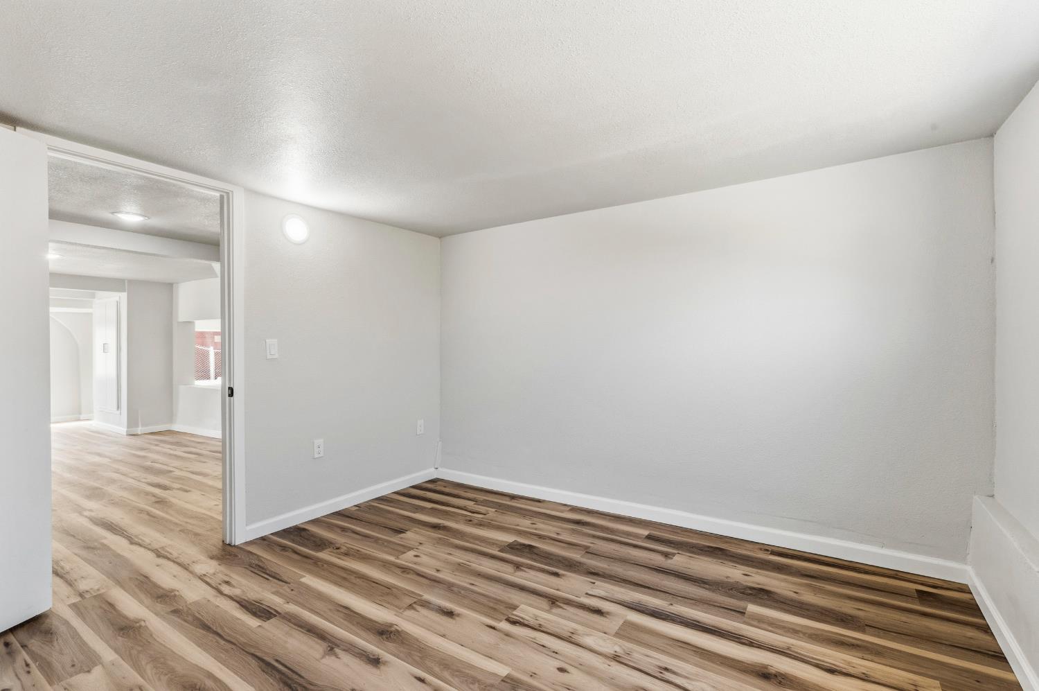 1821 River Road Modesto, CA 95351 - Photo 38 of 50 a view of a room with wooden floor