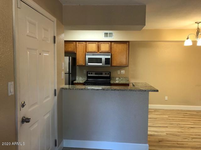 2625 East Indian School Road, Unit 204 Phoenix, AZ 85016 - Photo 17 of 20 Living room and Kitchen View 1