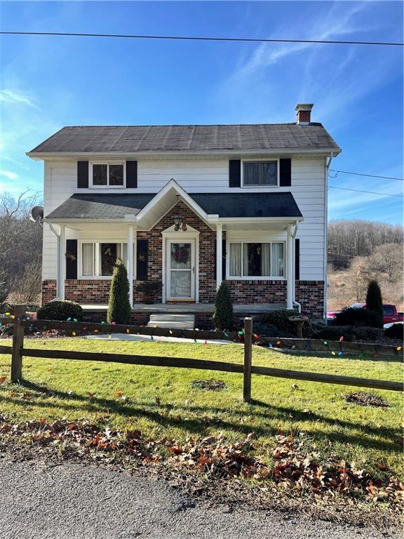 373 State Rte 1028 Dayton, PA 16222 - Photo 1 of 18 a front view of a house with a yard