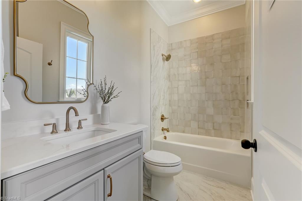 6806 Brennan Way Oak Ridge, NC 27310 - Photo 27 of 50 main level office en suite bath