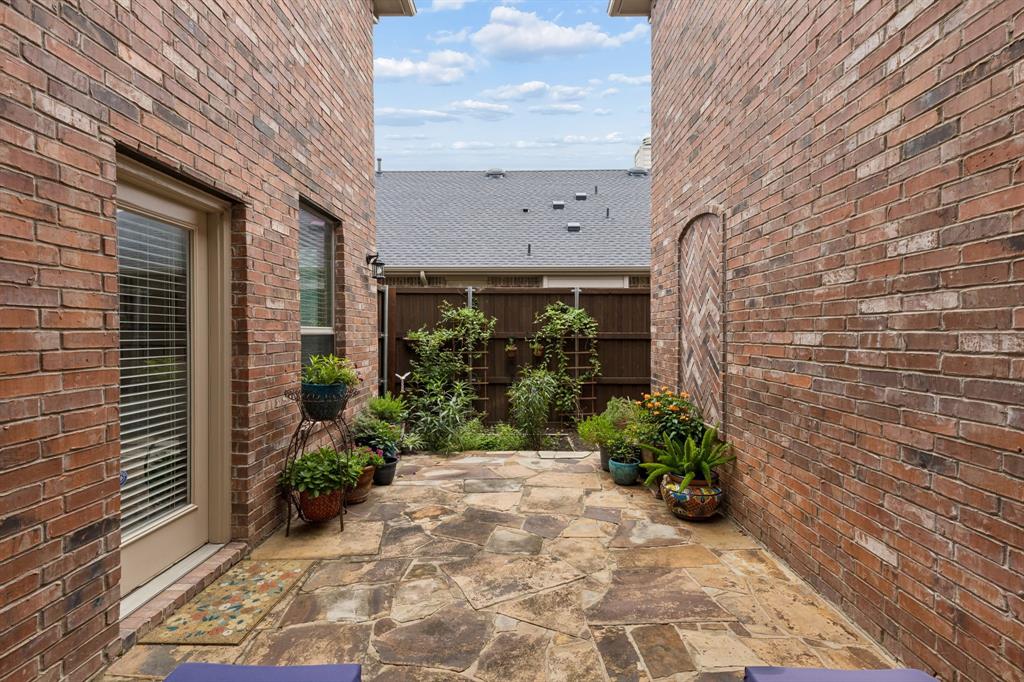 960 Remuda Road Frisco, TX 75033 - Photo 28 of 39 Private stone patio featuring flagstone paving