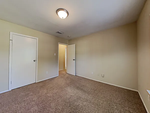 an empty room with an entryway