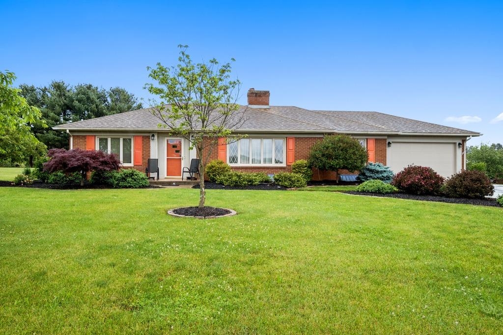1008 Ladd Road Waynesboro, VA 22980 - Photo 1 of 46 a front view of a house with a yard and green space