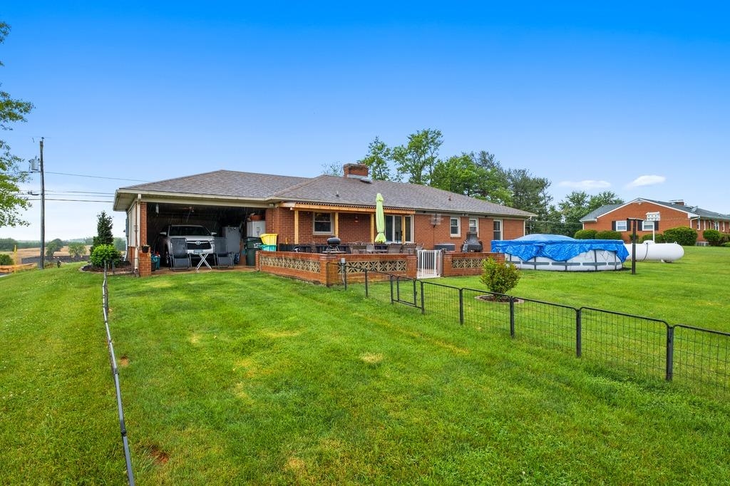 1008 Ladd Road Waynesboro, VA 22980 - Photo 36 of 46 a view of an house with backyard and a patio