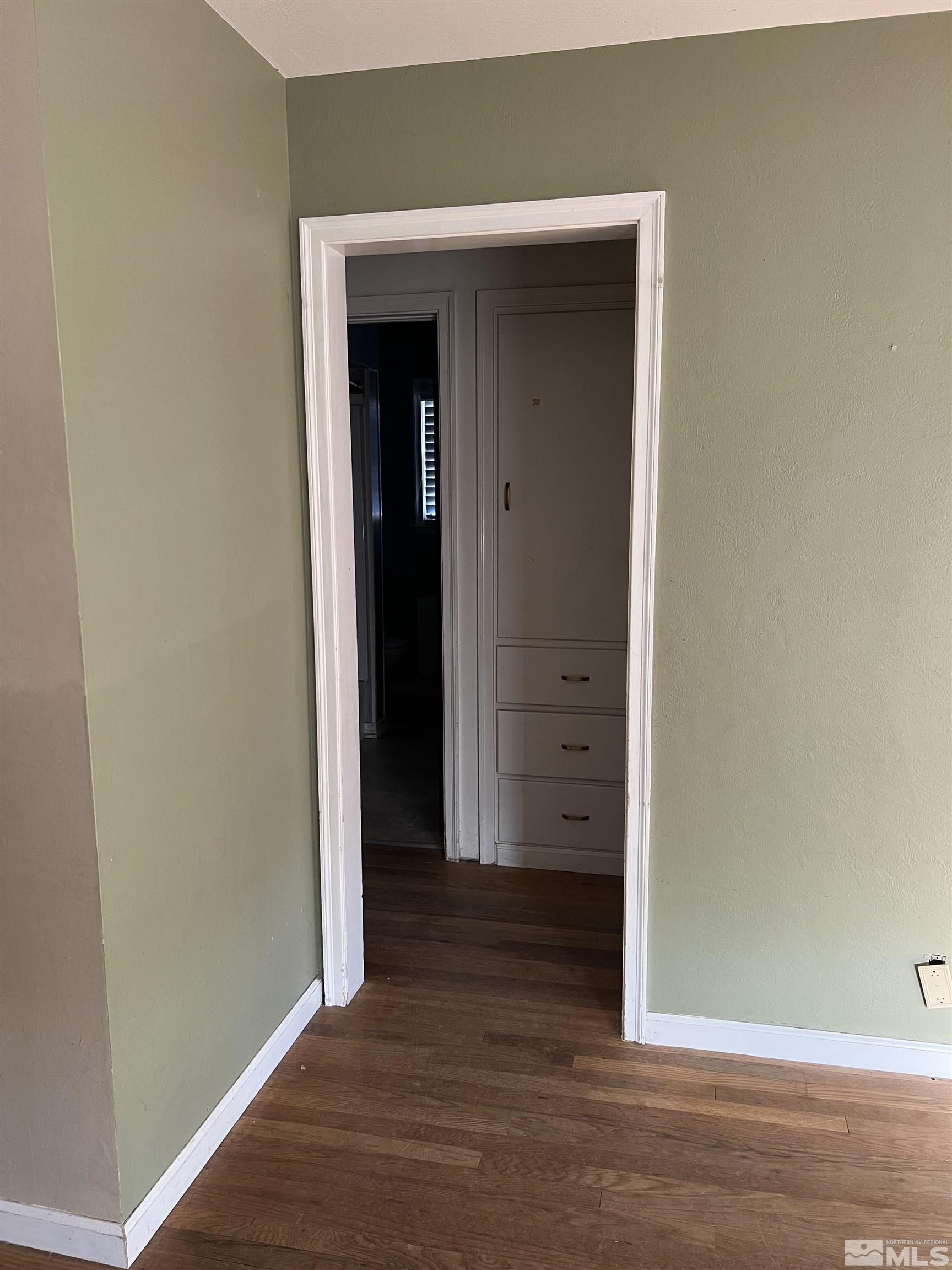 1575 Allen Street Reno, NV 89509 - Photo 8 of 8 an empty room with wooden floor and closet