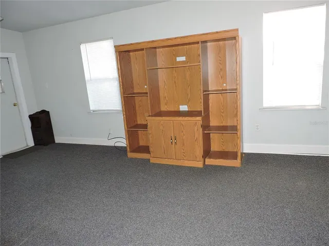 a view of a livingroom with a fireplace