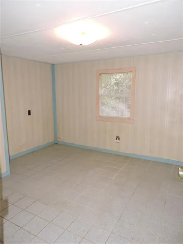 a view of a livingroom with furniture and windows
