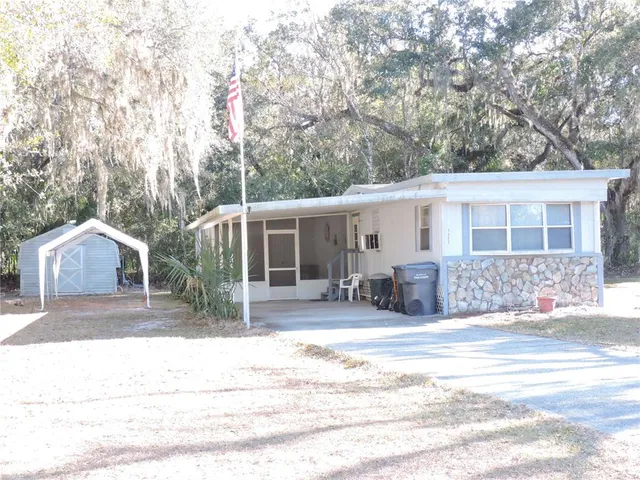 a front view of a house with a patio