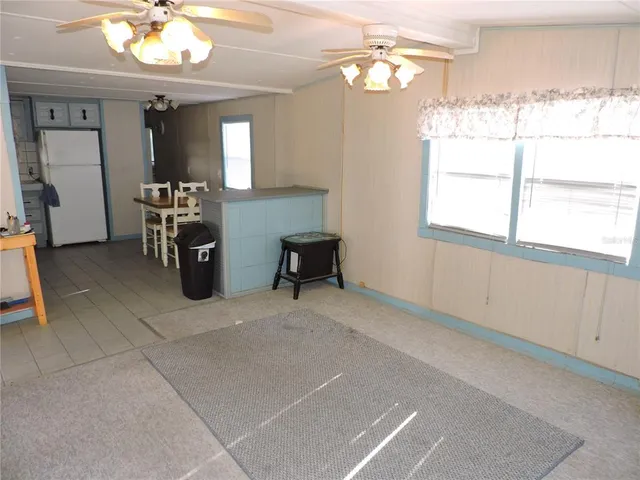 a view of a livingroom with a window