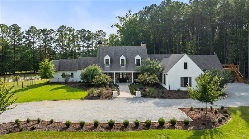 7255 Old Rico Road Chattahoochee Hills, GA 30268 - Photo 1 of 78 front view of house with yard and green space