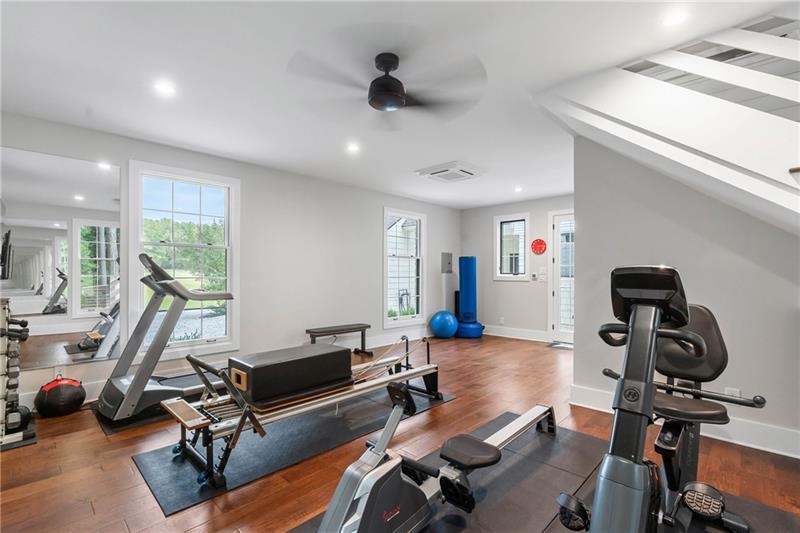 7255 Old Rico Road Chattahoochee Hills, GA 30268 - Photo 43 of 78 a view of a workspace with gym equipment
