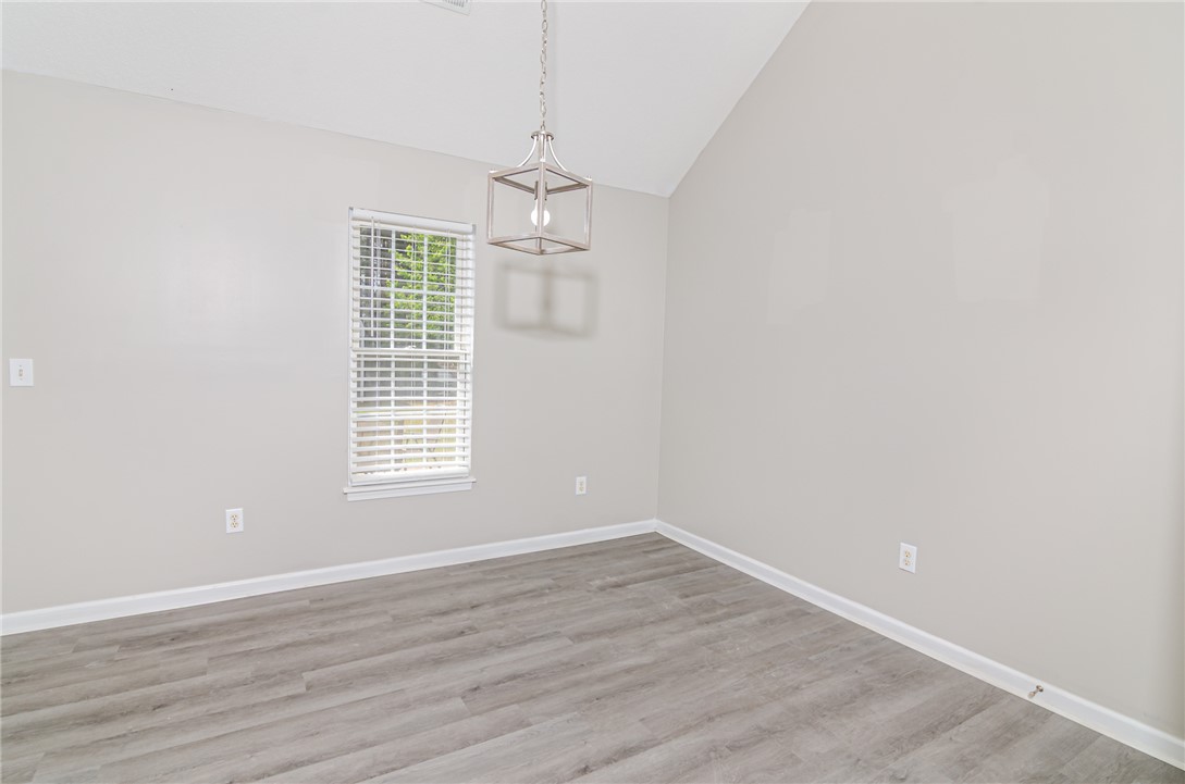 102 Hawk Ridge Drive Anderson, SC 29621 - Photo 17 of 38 This bright space features vaulted ceilings and light-toned flooring.