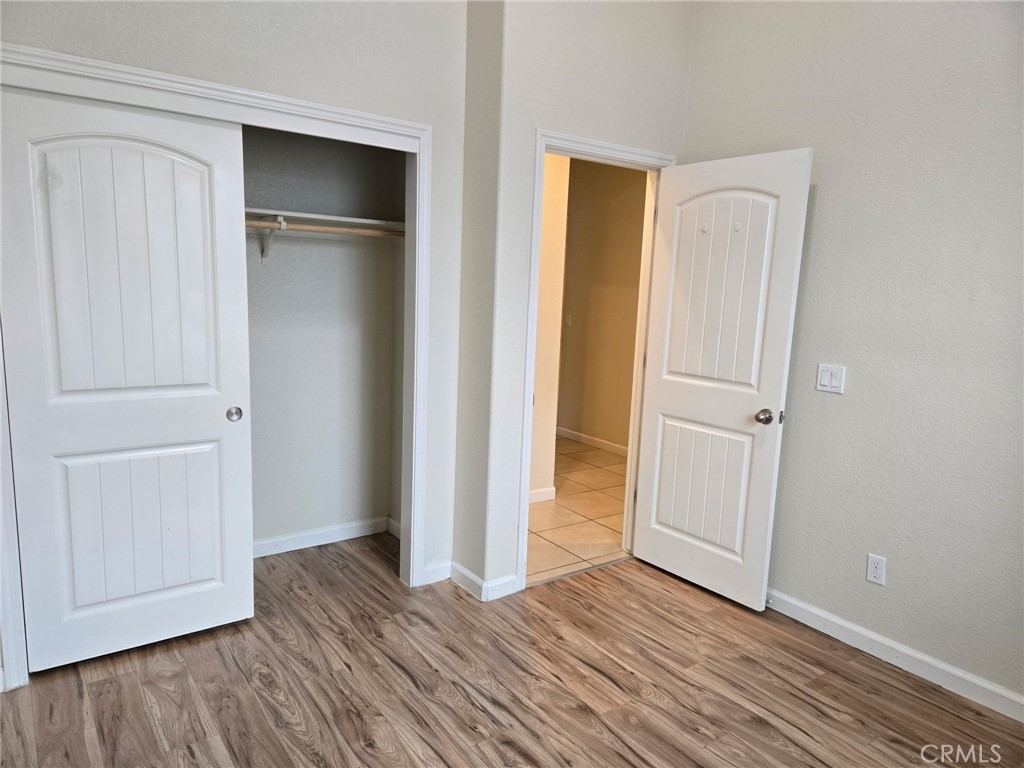 1442 Dynes Street Merced, CA 95348 - Photo 7 of 7 a view of empty room with wooden floor