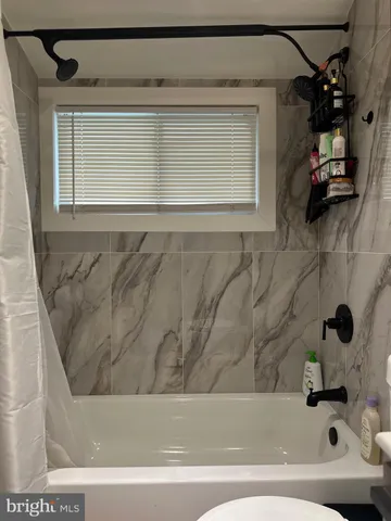 a bathroom with a bathtub