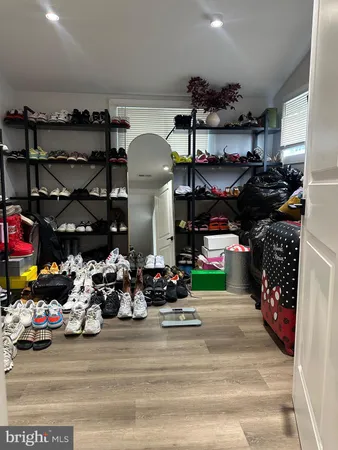 a store room with lots of different colored cloths