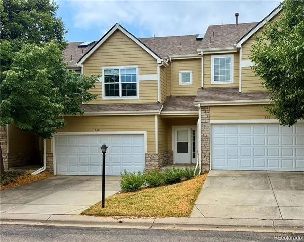 a view of front of house with garage