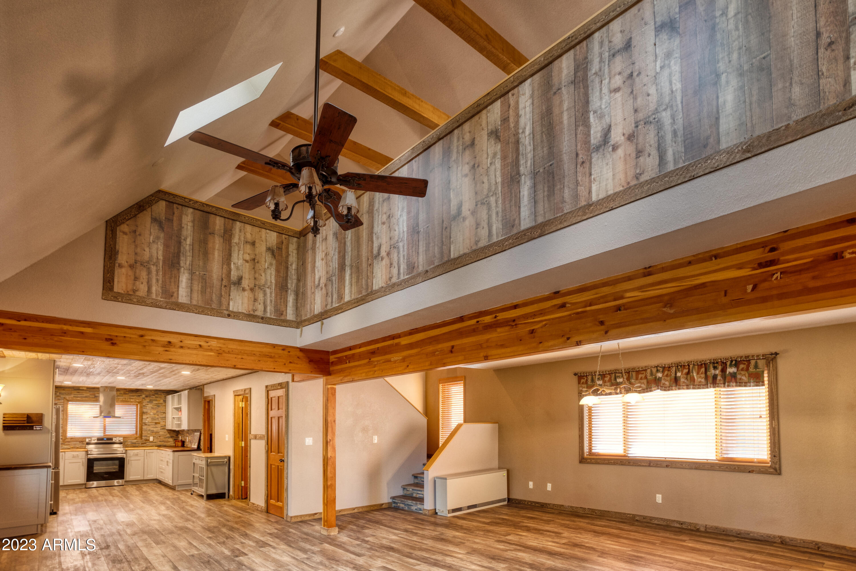 2282 Lindberg Road Overgaard, AZ 85933 - Photo 27 of 30 Family Room looking up towards Loft