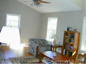 77 Hampton Road Leicester, NC 28748 - Photo 3 of 9 a view of a dining room with furniture and a window
