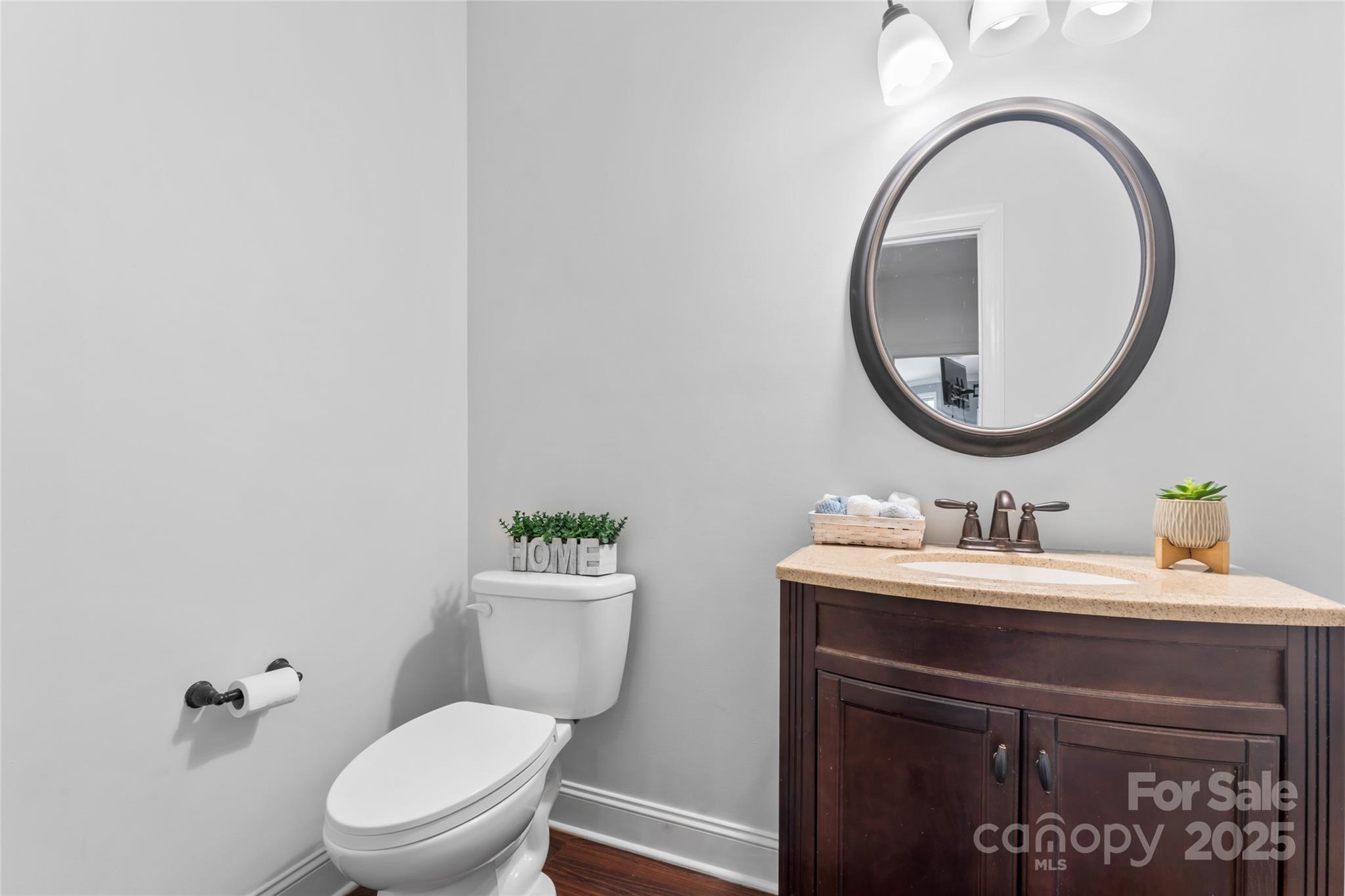 1485 State Rd S-46-1102 York, SC 29745 - Photo 11 of 42 a bathroom with a toilet a sink and a mirror