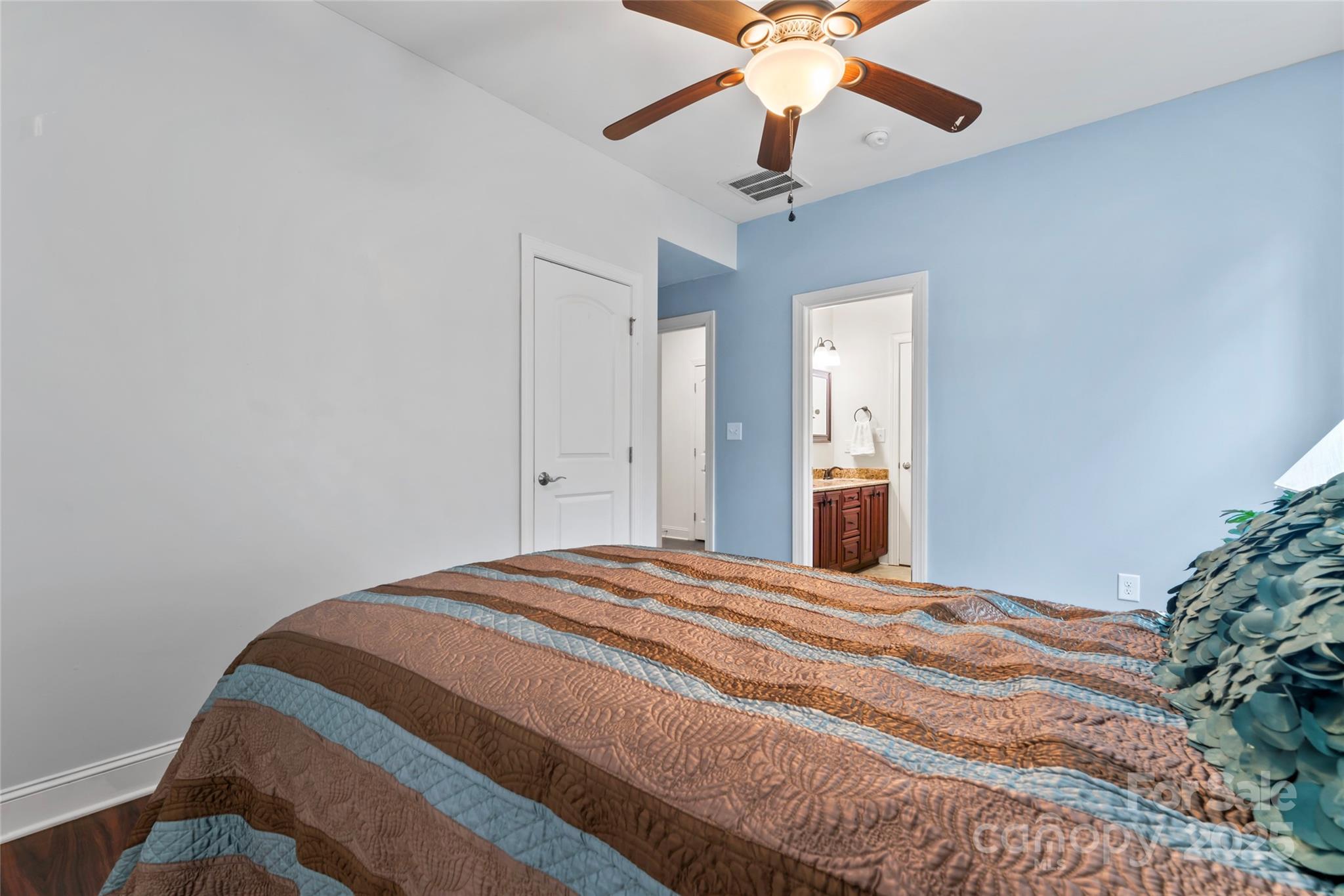 1485 State Rd S-46-1102 York, SC 29745 - Photo 23 of 42 a bedroom with a bed and a chandelier