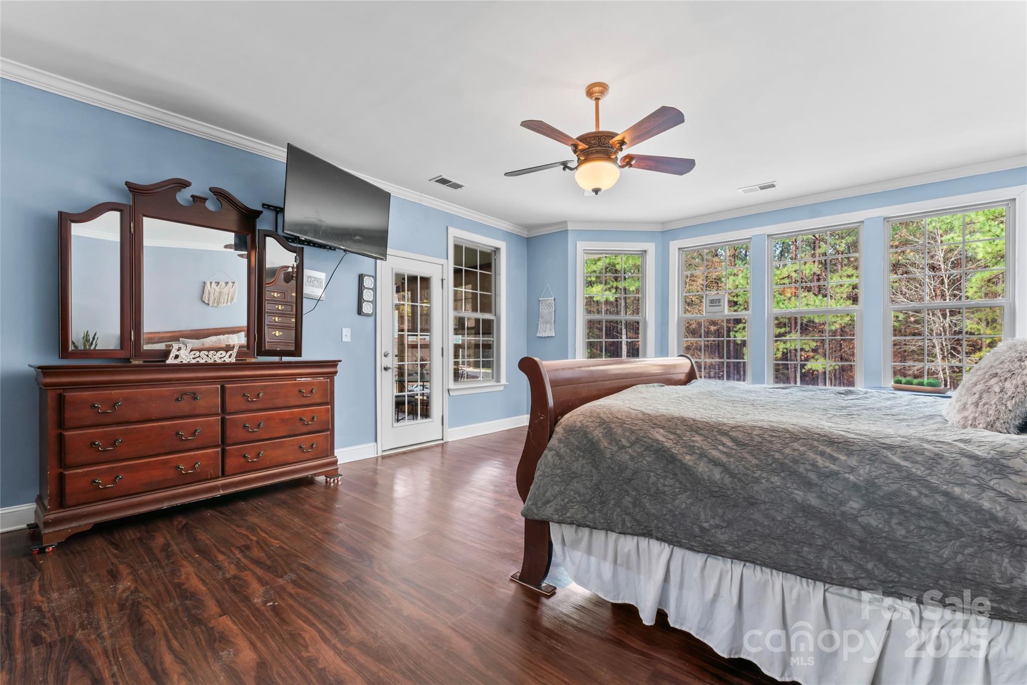 1485 State Rd S-46-1102 York, SC 29745 - Photo 26 of 42 a bedroom with a bed and a large window with wooden floor