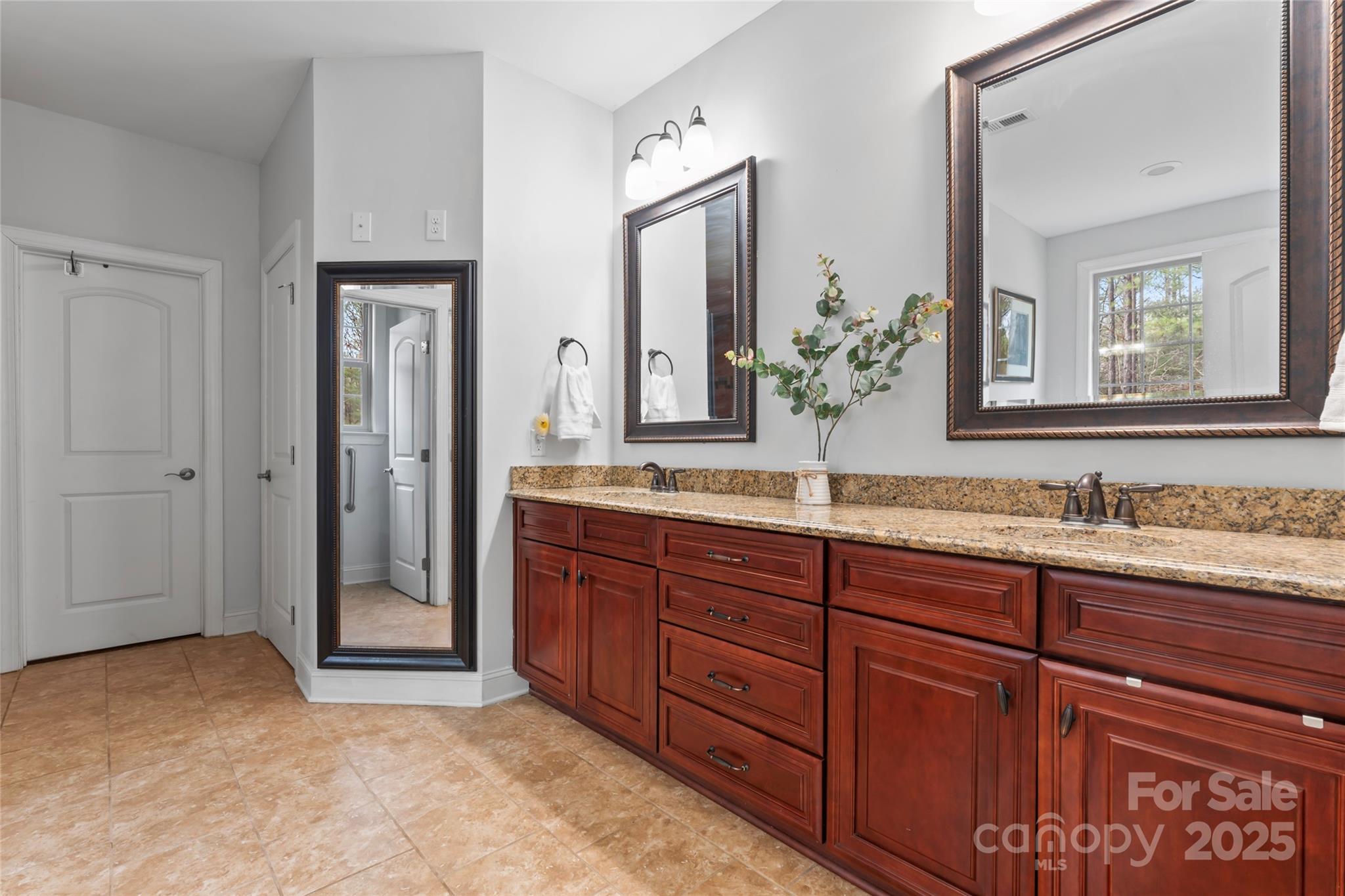 1485 State Rd S-46-1102 York, SC 29745 - Photo 29 of 42 a bathroom with a granite countertop sink and a mirror
