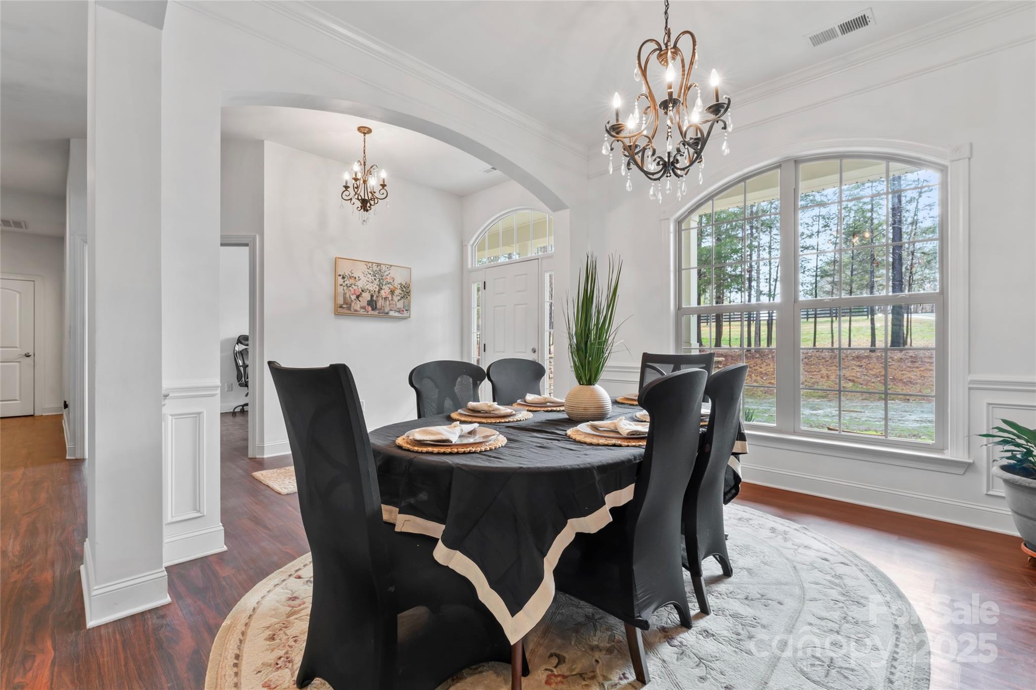 1485 State Rd S-46-1102 York, SC 29745 - Photo 6 of 42 a dining room with furniture a large window and wooden floor